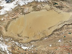 Dunes: sand dunes in Taklamakan desert, from space