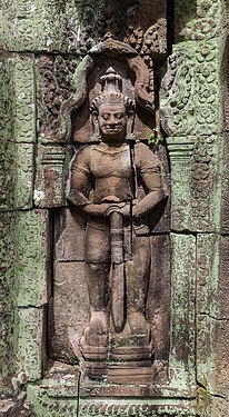 Bas-relief of a Dvarapala at Banteay Kdei in Angkor, Cambodia.