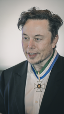 Musk wearing a medal