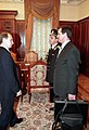 Then-Acting President Vladimir Putin receiving the "nuclear briefcase" on 31 December 1999.