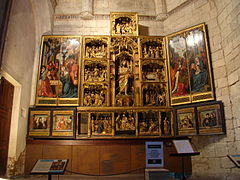 Retablo de San Juan Bautista de la iglesia del Salvador de Valladolid, ca. 1500 (el banco se realizó por artistas locales).[137]​