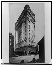 Grayscale photograph of the St. Regis Hotel as seen from the ground level, circa 1905