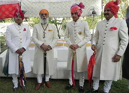 Achkan sherwani and churidar (lower body) worn by Arvind Singh Mewar and his kin during a Hindu wedding in Rajasthan, India