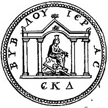 Drawing of a coin showing a seated female figure and four temple pillars. The woman wears a veiled and wears a large headdress. Under her, a man is shown in a swimming position, a representation of a river.