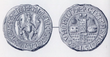 Photo of two ancient silver circular seals of Aimery, with non-Latin words framing the outer part of the seals.