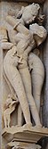 A-4. Temple relief sculpture of a kissing couple at Khajuraho, Madhya Pradesh, a UNESCO World Heritage Site.