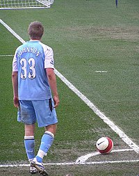 Manchester City's Michael Johnson taking a corner