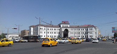 Taxi and tram on Rudaki Street in Samarqand