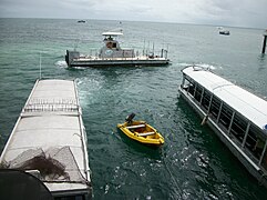 Glass bottom boats and a Semi submarine at Green Island, Great Barrier Reef, outer Cairns