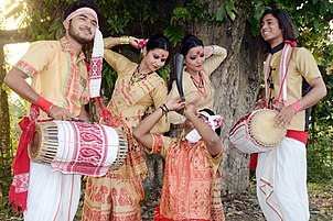 Assamese youth performing Bihu Dance