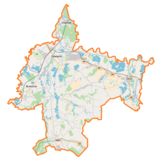 Mapa konturowa powiatu oświęcimskiego, blisko centrum na lewo u góry znajduje się punkt z opisem „Parafia Najświętszej Maryi Panny Wspomożenia Wiernych”