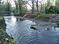 Remains of a weir on the River Brent Looking westward from the right hand bank.