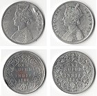 Two silver rupee coins issued by the British Raj in 1862 and 1886 respectively, the first in obverse showing a bust of Victoria, Queen, the second of Victoria, Empress. Victoria became Empress of India in 1876.