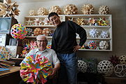 Pedagogy to art: Magnus Wenninger with some of his stellated polyhedra, 2009