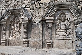 Sculptures in the Martand Temple. The trefoil arch is a characteristic feature of Brahminical temple architecture in Kashmir.[69]