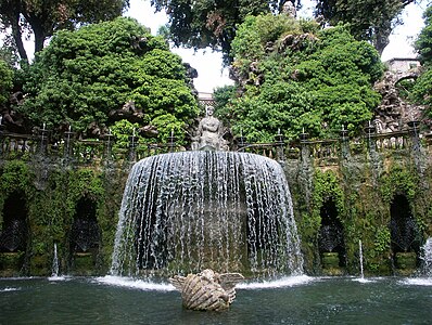 The Fontana dell'Ovato ("Oval Fountain") cascades from its egg-shaped basin into a pool set against a rustic nymphaeum.