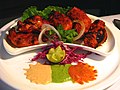 Image 26Chicken tikka, a well-known dish across the globe, reflects the South Asian cooking style. (from Culture of Asia)