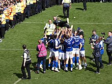 Ipswich Town manager Kieran McKenna is thrown into the air by his players on the pitch at Portman Road after Town sealed back-to-back promotions and a first return to the Premier League in 22 years.