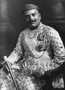 Sayajirao Gaekwad III, Maharaja of Baroda, wearing the sash and star of a Knight Grand Commander (GCSI), along with the star of a Knight Grand Commander of the Order of the Indian Empire (GCIE)
