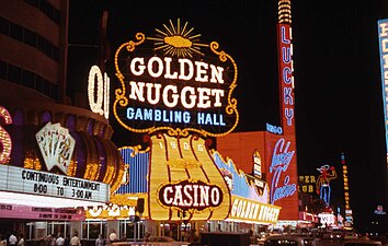 Fremont Street (1964), night view directed west; Golden Nugget decoration is much brighter