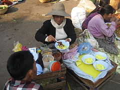 To hpu thouk (Shan tofu salad) hawker at Kaingdan Market in Mandalay