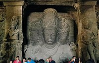 The Colossal 6 metres (20 ft) high trimurti sculpture at the Elephanta Caves