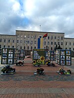 Regional State Administration (in front of her are photographs of fallen soldiers)