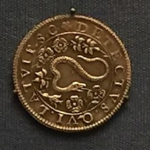 Coin as described.