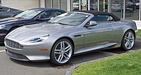 Front three-quarters view of a silver Virage Volante convertible