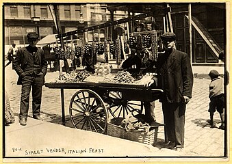 Street vender with merchandise cart (1908)