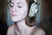 10 Woman listening privately to music through headphones (Russia, 2010)