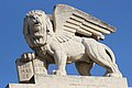 Lion of St. Mark with plaque atop the Generali Building in Jerusalem