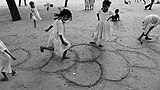 C-7. (Hopscotch traditional) School girls playing hopscotch in the Sabarmati Ashram of Mahatma Gandhi