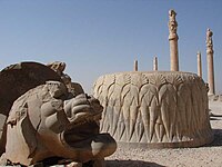 Lion fragment and column base at Persepolis