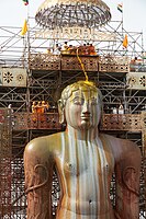 Gommateshwara statue during the Grand Consecration Mahamastakabhisheka in August 2018 at Shravanabelagola, Karnataka. Mahamastakabhisheka is held every 12 years and is considered one of Jainism's most auspicious celebrations.