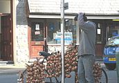 Breton onion salesman with bicycle travelling through Wales may be involved in cold calling on new clients and relationship selling for existing clients