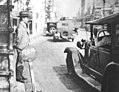 Image 4A Tokyo taxi driver indicating a fare of 50 Sen by holding up five fingers, in 1932 (from Transport in Greater Tokyo)