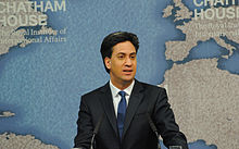 Colour photograph of Ed Miliband speaking from behind a podium at Chatham House in April 2015