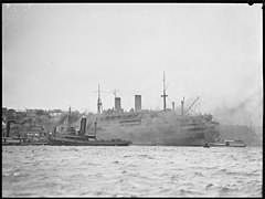 Ship surrounded by tug boats, Sydney, 1942]