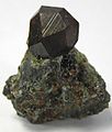 Image 12Black andradite, an end-member of the orthosilicate garnet group. (from Mineral)