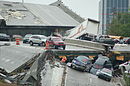 The I35W bridge four days after the collapse. The cars are numbered as part of the investigation.