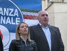 Giorgia Meloni with Guido Crosetto at a FdI rally in 2014