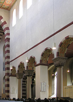 St Michael's, Hildesheim, shows two columns set between the piers.