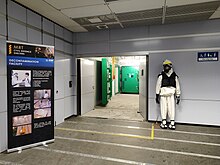 An opened door leads into the decontamination facilities.