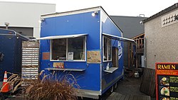 Photograph of a blue food cart