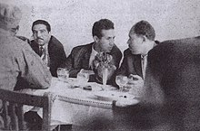 Men sitting around a table