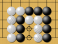Image 7Example of seki (mutual life). Neither Black nor White can play on the marked points without reducing their own liberties for those groups to one (self-atari). (from Go (game))