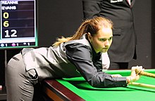 Reanne Evans ready to play a shot with the rest