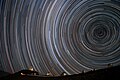Image 42Starry circles arc around the south celestial pole, seen overhead at ESO's La Silla Observatory. (from Earth's rotation)