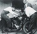 Image 8Ernesto 'Che' Guevara (left) holding the handlebars of his 500 cc single cylinder Norton motorcycle (from Outline of motorcycles and motorcycling)